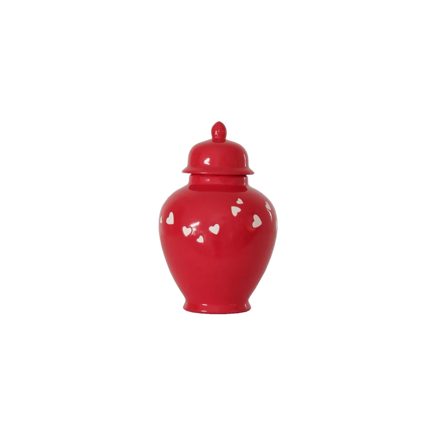 The 'Love is in the Air' red ginger jar on a shelf, adding charm to home decor.