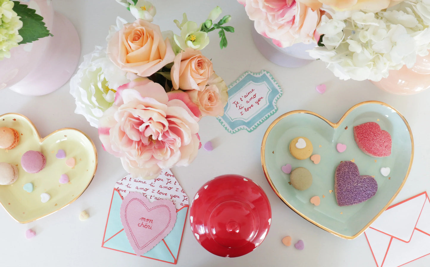 Handcrafted 'Love is in the Air' ginger jar displayed against a neutral background.