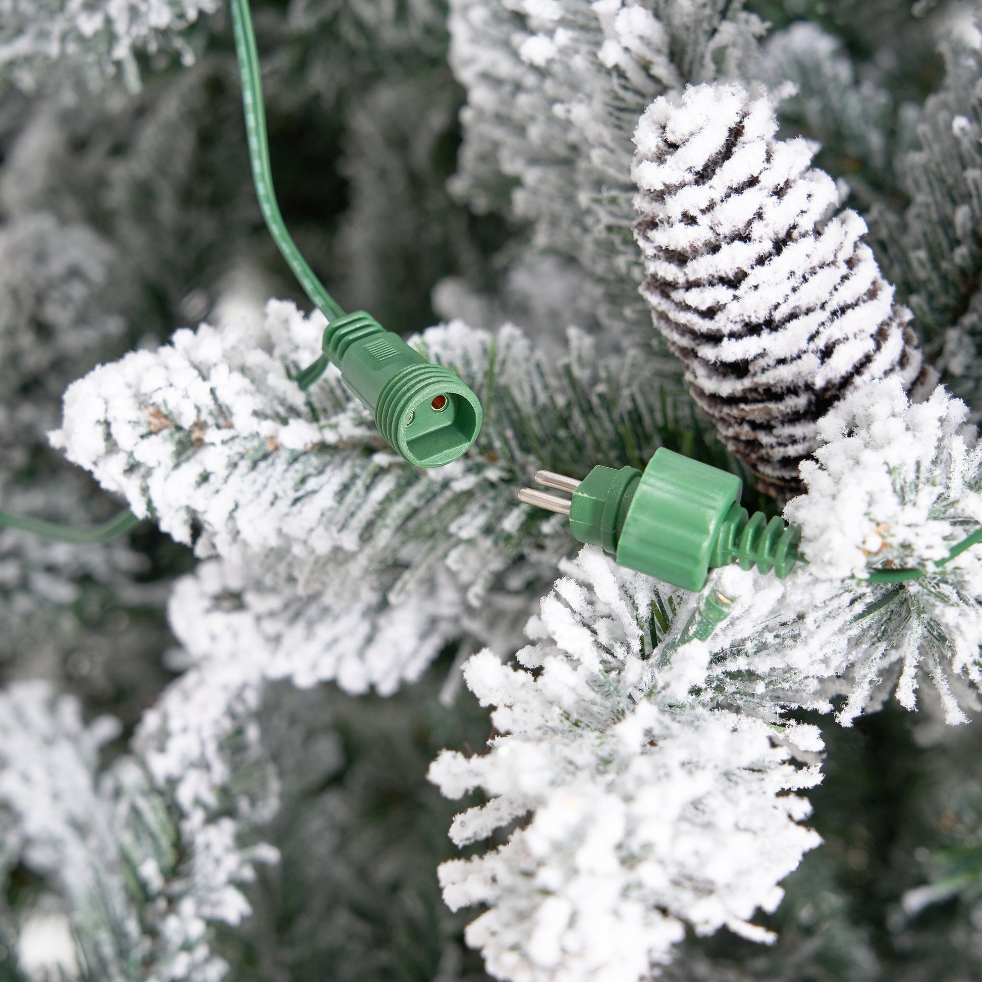 Overall look at the 10’ Flocked Livingston Fir Artificial Christmas Tree, perfect for creating a festive holiday atmosphere.